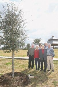Family Next to Their Memorial Tree
